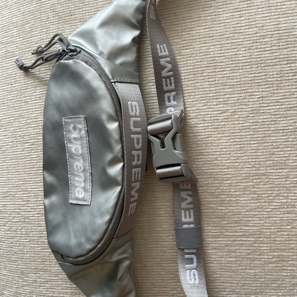 Supreme Gray Belt Bag with Crescent Shape and Branded Strap